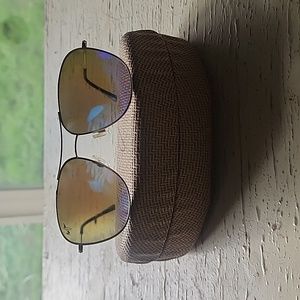 Maui Jim brand sunglasses, color turtle handles with silver frame
